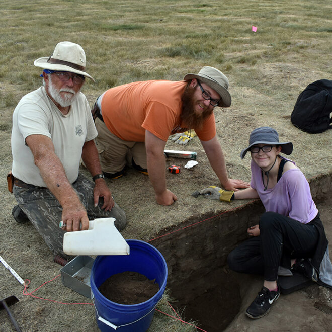 Volunteers excavating a pit feature. Courtesy of Stephen Perkins.