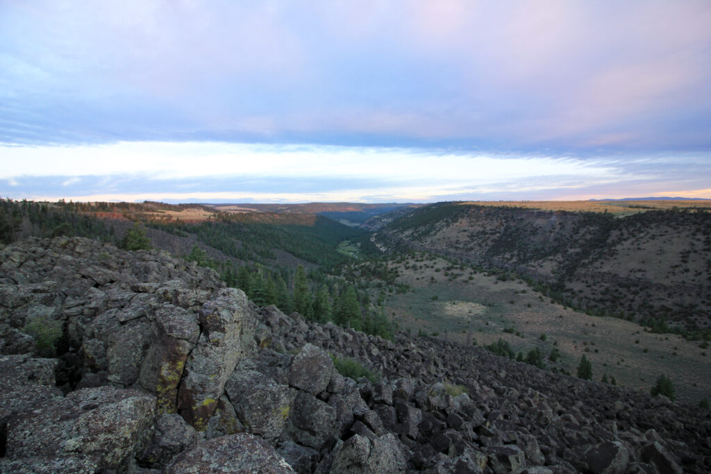 Looking over the rim to the La Botica site. Photo by Cal Ruleman.
